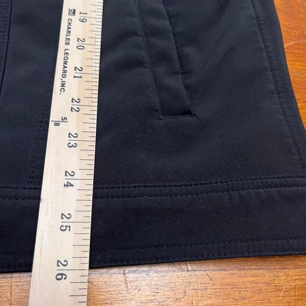Levi's black soft shell jacket with snap button closure